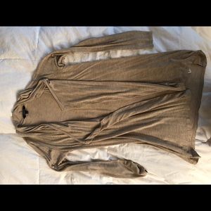 Small, thigh-length cardigan